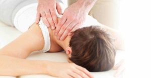 Massage therapist doing remedial massage to client in Perth