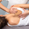 Woman having massage therapy in Perth for shoulder, arm, and hand injuries