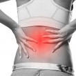 Woman's back needs lower back pain treatment